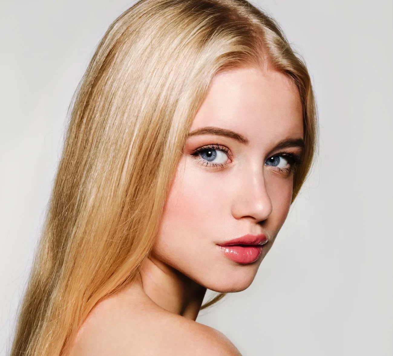 Portrait Of Beautiful Blonde Young Woman Face 